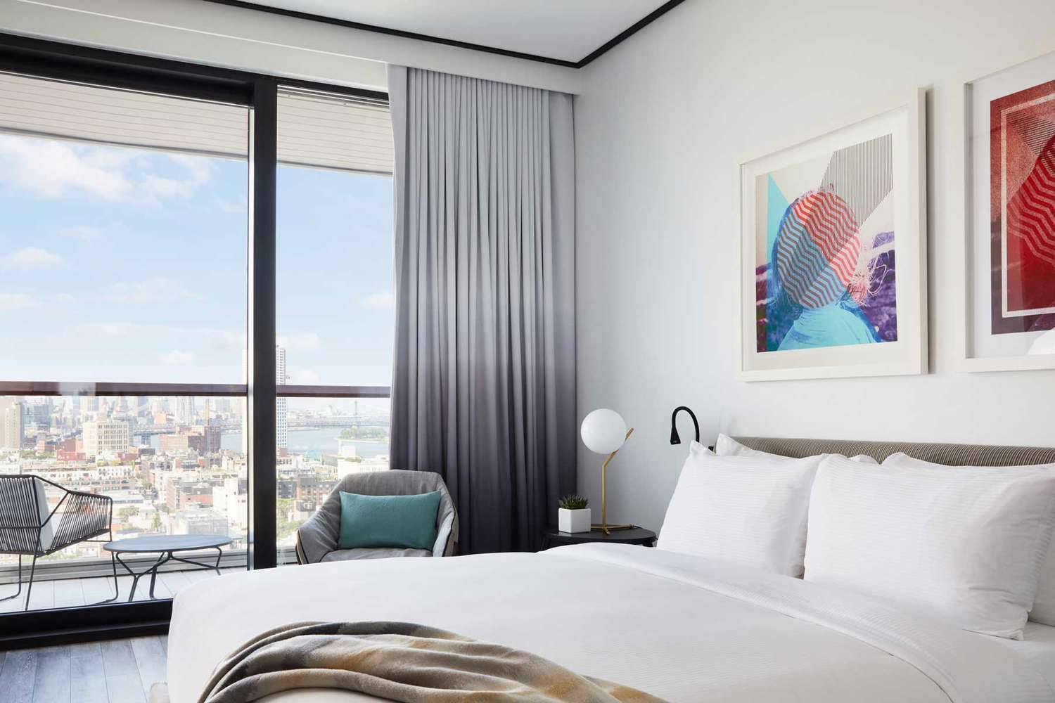 Bedroom with a view and balcony at The William Vale in Brooklyn, NY